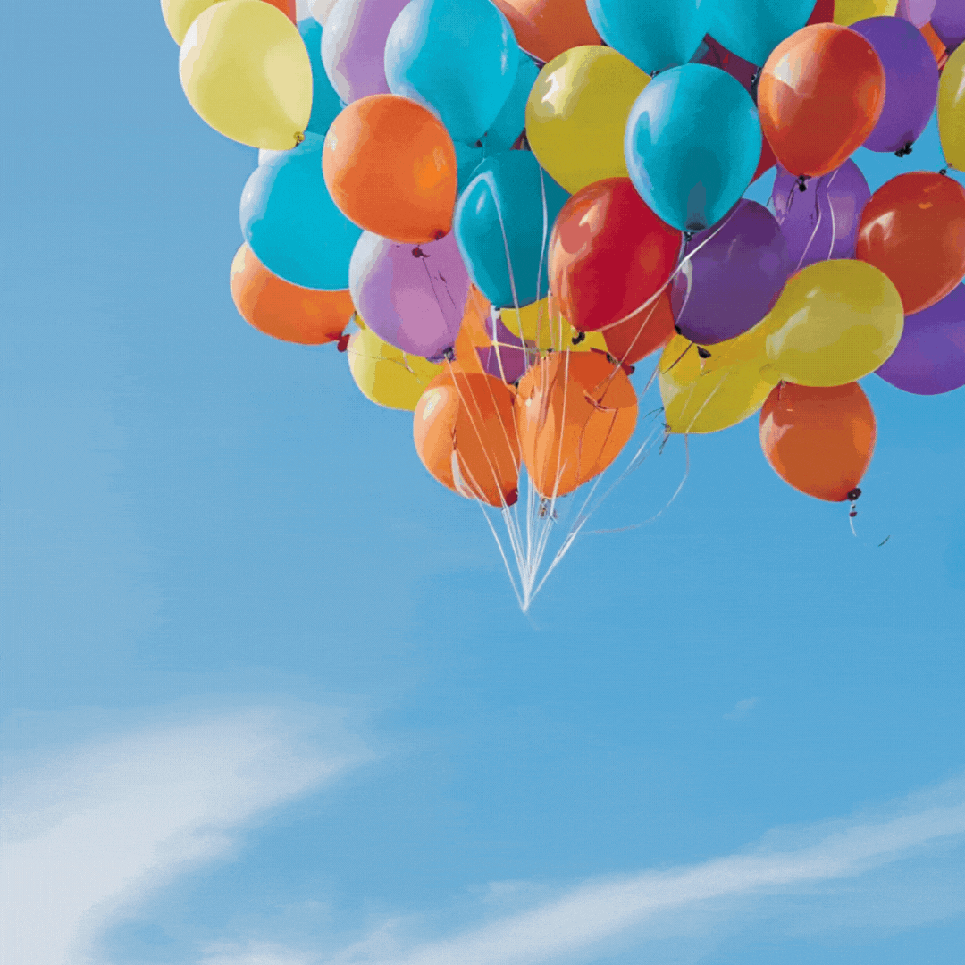 Zeitschrift wird von Luftballons geflogen